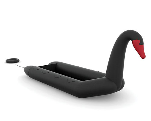 vacation vs immigration: designers fuse a refugee boat with an inflatable swan