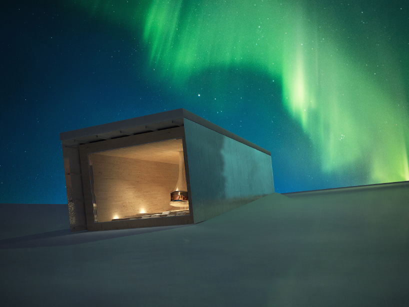 christophe benichou's sliding shelter appears to descend towards an icy lake