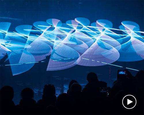 collectif scale's 'ballet of robots' makes light dance in lyon, france