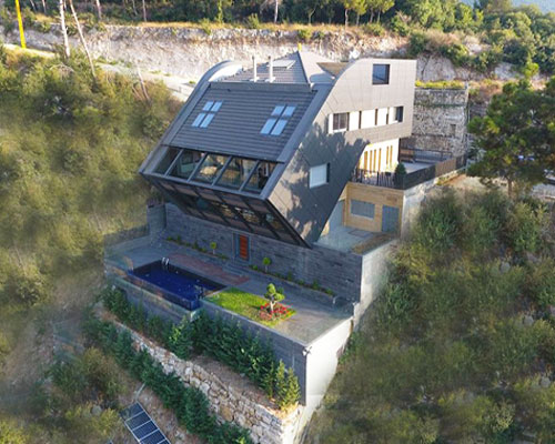 DAZARCHITECTS designs a family house to step into a cliffside in lebanon