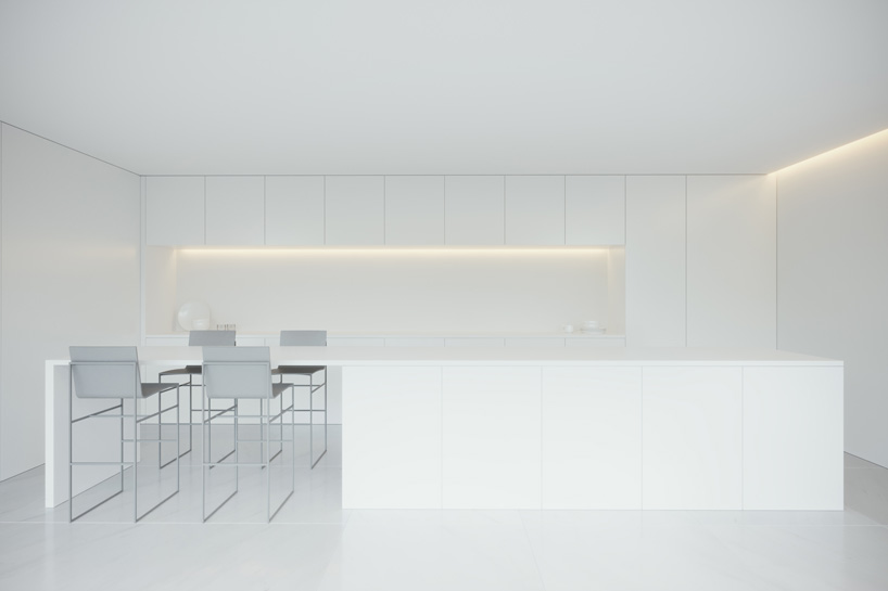 fran silvestre arquitectos stacks two monolithic volumes for house in rio de janeiro