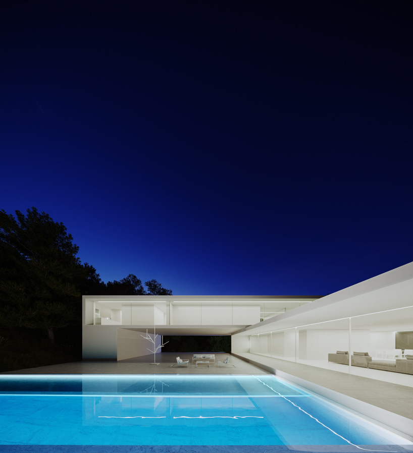 fran silvestre arquitectos stacks two monolithic volumes for house in rio de janeiro