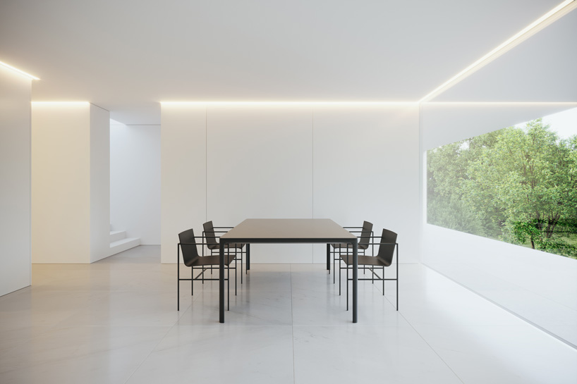 fran silvestre arquitectos stacks two monolithic volumes for house in rio de janeiro