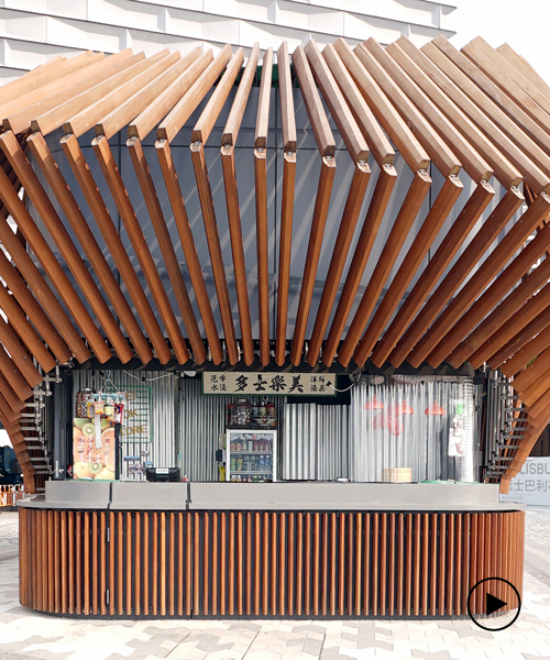 LAAB's kinetic 'harbour kiosk' in hong hong opens + closes using robotic timber fins