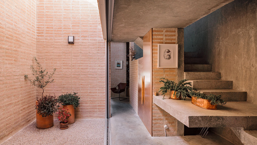 malu de miguel splits brick + concrete family house in madrid in two separate pavilions