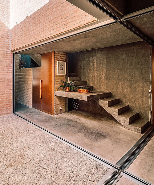 malu de miguel splits brick + concrete family house in madrid in two separate pavilions