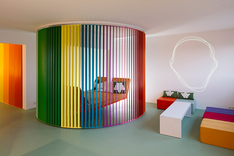 matali crasset turns paris apartment renovation into rainbow-infused space