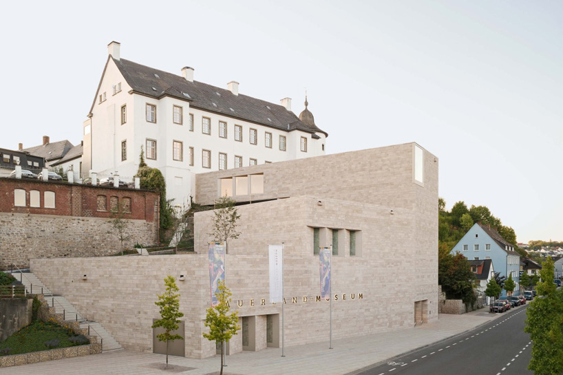 bez+kock architekten adds travertine extension to 17-th century german museum