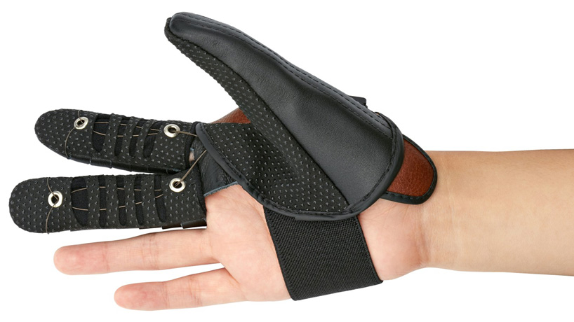the neomano robotic glove powers people with hand paralysis