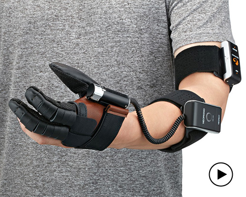 the neomano robotic glove powers people with hand paralysis