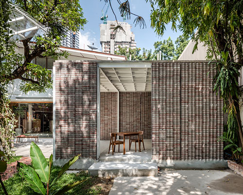 PHTAA transforms historic home into modern restaurant and coffee bar in bangkok