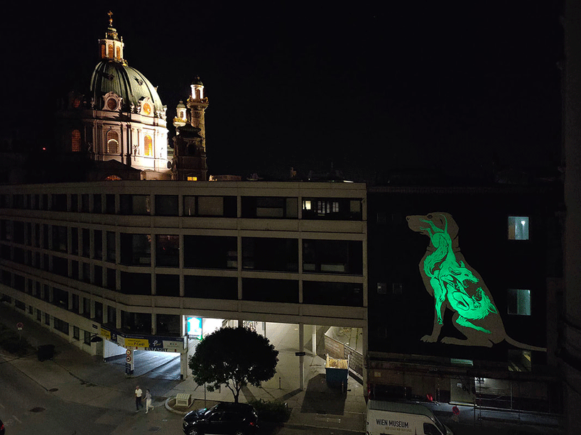 reskate studio unveils three glow-in-the-dark street murals with hidden messages