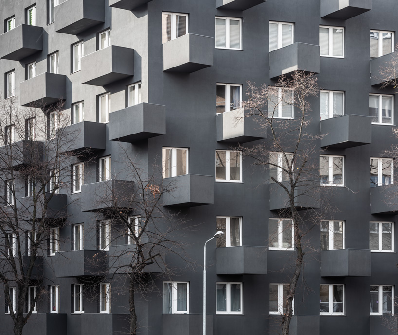 balconies protrude from KWK promes' apartment block in poland