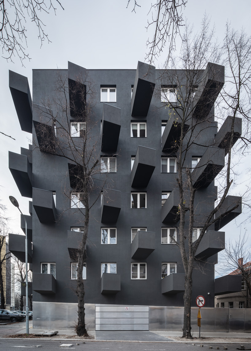 balconies protrude from KWK promes' apartment block in poland