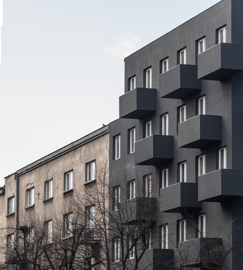 balconies protrude from KWK promes' apartment block in poland