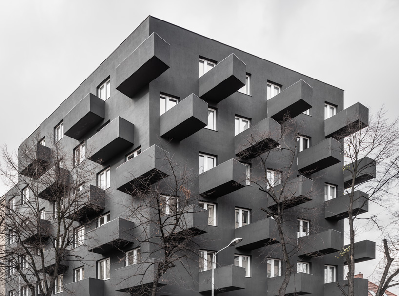 balconies protrude from KWK promes' apartment block in poland