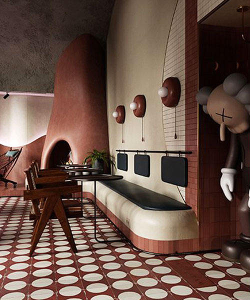 roman plyus applies terracotta plaster and reclaimed tiles to restaurant in budapest