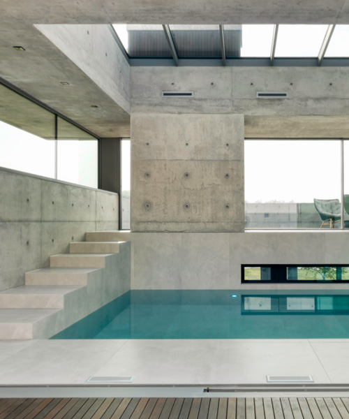 dreessen willemse architecten's concrete 'villa 22º' is nestled in a dutch hill