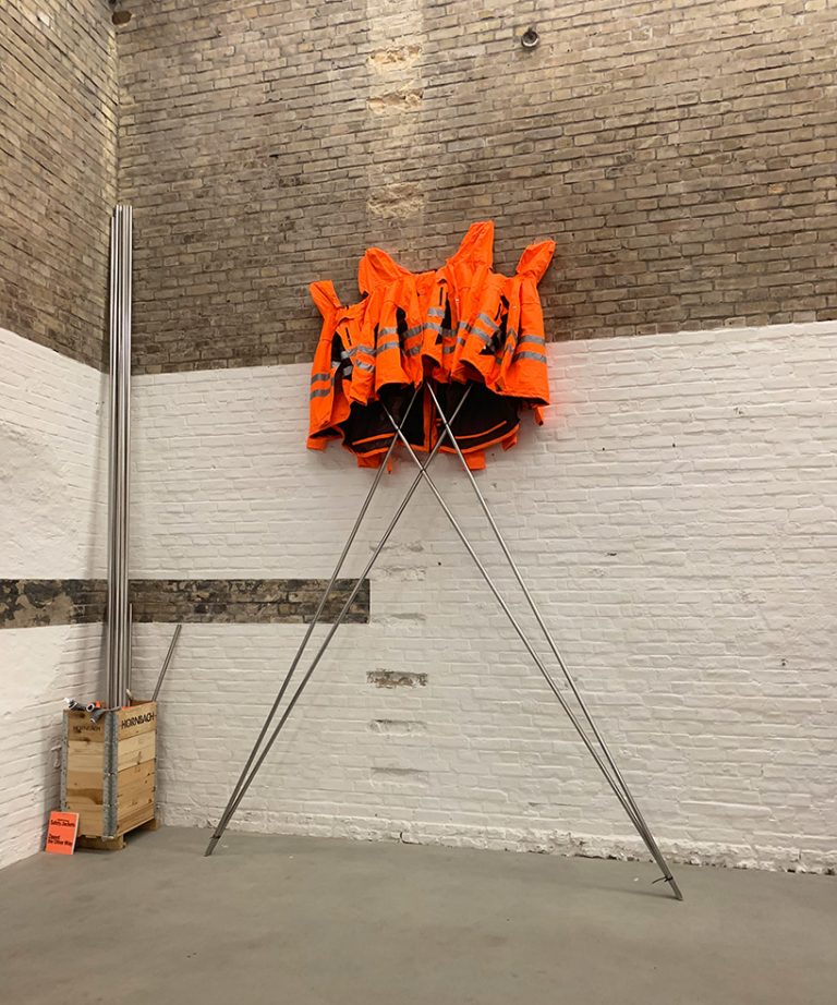 ai weiwei makes DIY sculpture with HORNBACH safety jackets zipped the other way