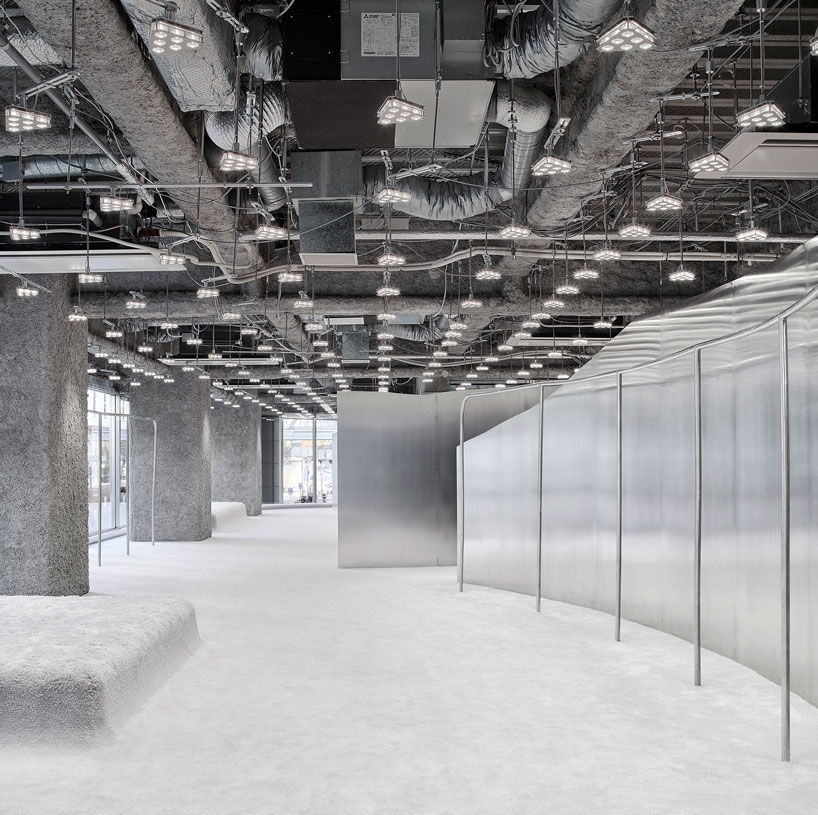 curved stainless steel defines arquitectura-g's acne studios store in nagoya, japan designboom