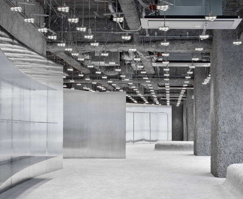 curved stainless steel defines arquitectura-g's acne studios store in nagoya, japan designboom