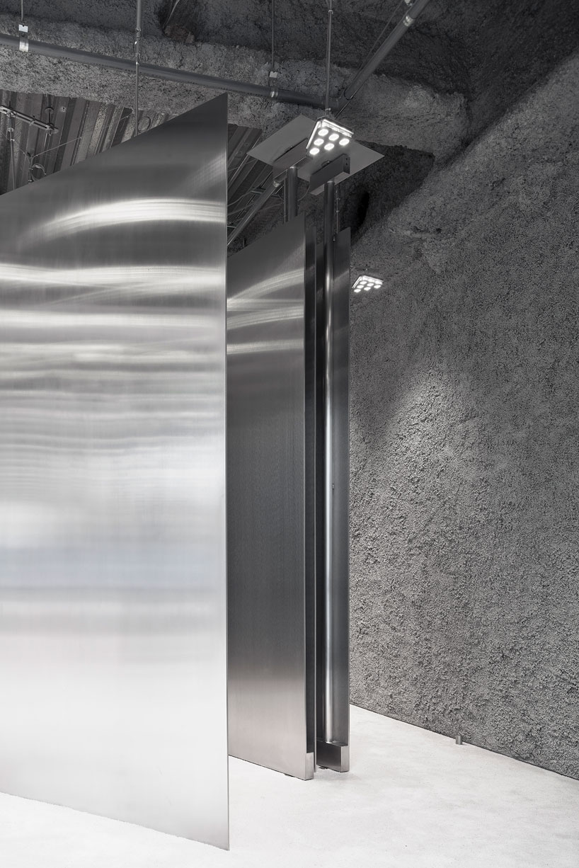 curved stainless steel defines arquitectura-g's acne studios store in nagoya, japan designboom