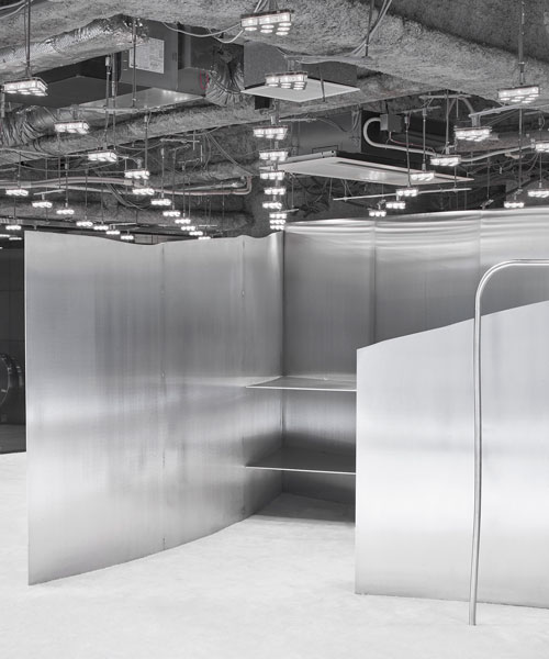 curved stainless steel defines arquitectura-G's acne studios store in nagoya, japan