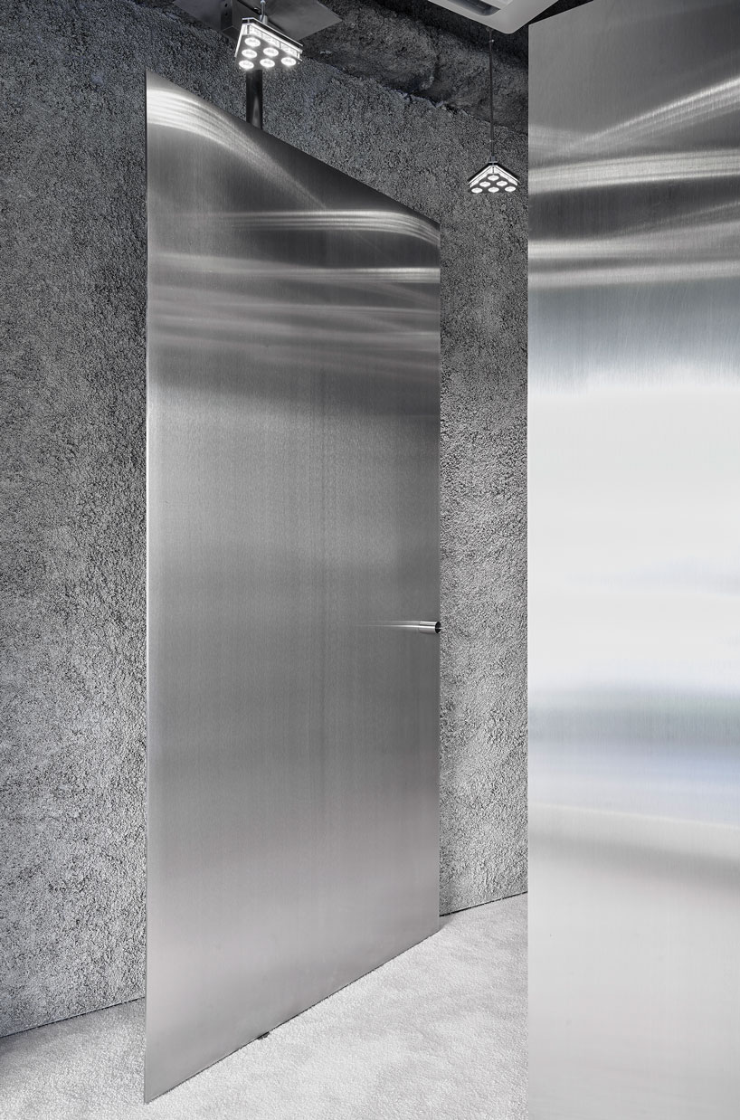 curved stainless steel defines arquitectura-g's acne studios store in nagoya, japan designboom