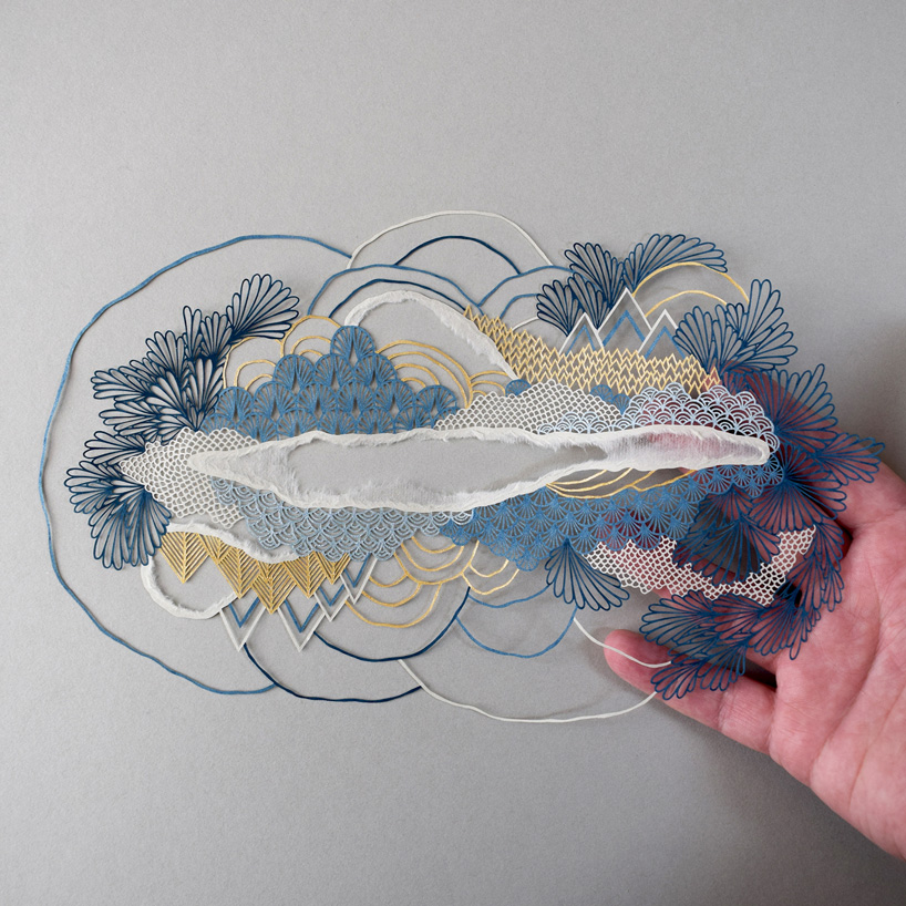 artist pippa dyrlaga cuts intricately detailed landscapes from paper