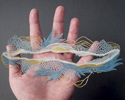 artist pippa dyrlaga cuts intricately detailed landscapes from paper