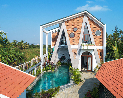 VRA designs its 'cam thanh A&A villa' to recall the sunny coconut palms of vietnam