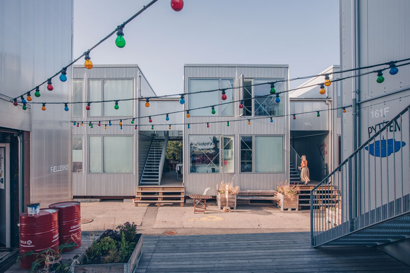 'container atlas' charts the evolution of shipping container architecture designboom