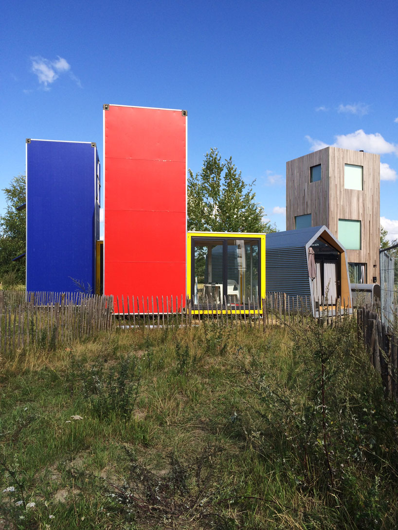 'container atlas' charts the evolution of shipping container architecture designboom