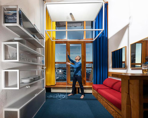 coudamy refurbishes 19 sqm les arcs apartment with a space saving 'flying table'