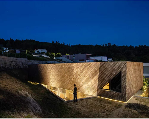 REM'A subtracts geometric cuts from the landscape of portugal with casa A