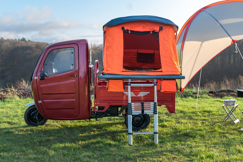 the 'elektro frosch' electric tricycle doubles as a micro camper home 