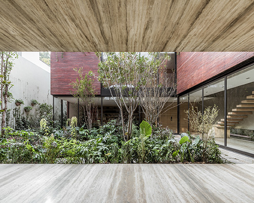 esrawe studio shapes casa sierra fría in mexico as a monolithic brick structure