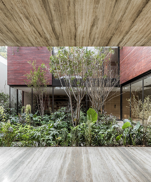 esrawe studio shapes casa sierra fría in mexico as a monolithic brick structure
