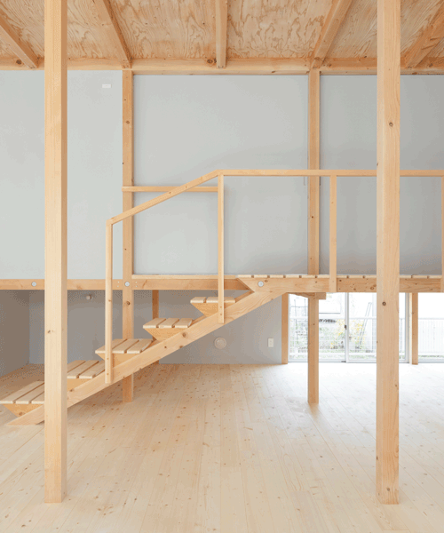 japanese wooden house by naoya kitamura is built around a central double-height space
