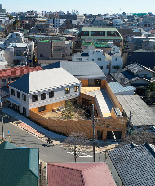 naf architect & design encloses 'small pond' nursery school in tokyo with curved wood façade