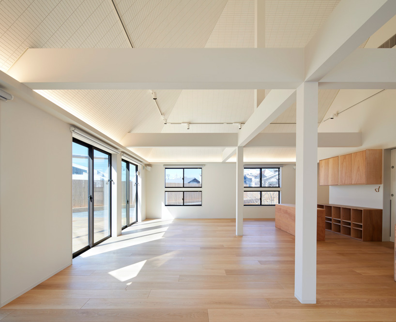 naf architect & design encloses 'small pond' nursery school in tokyo with curved wood façade