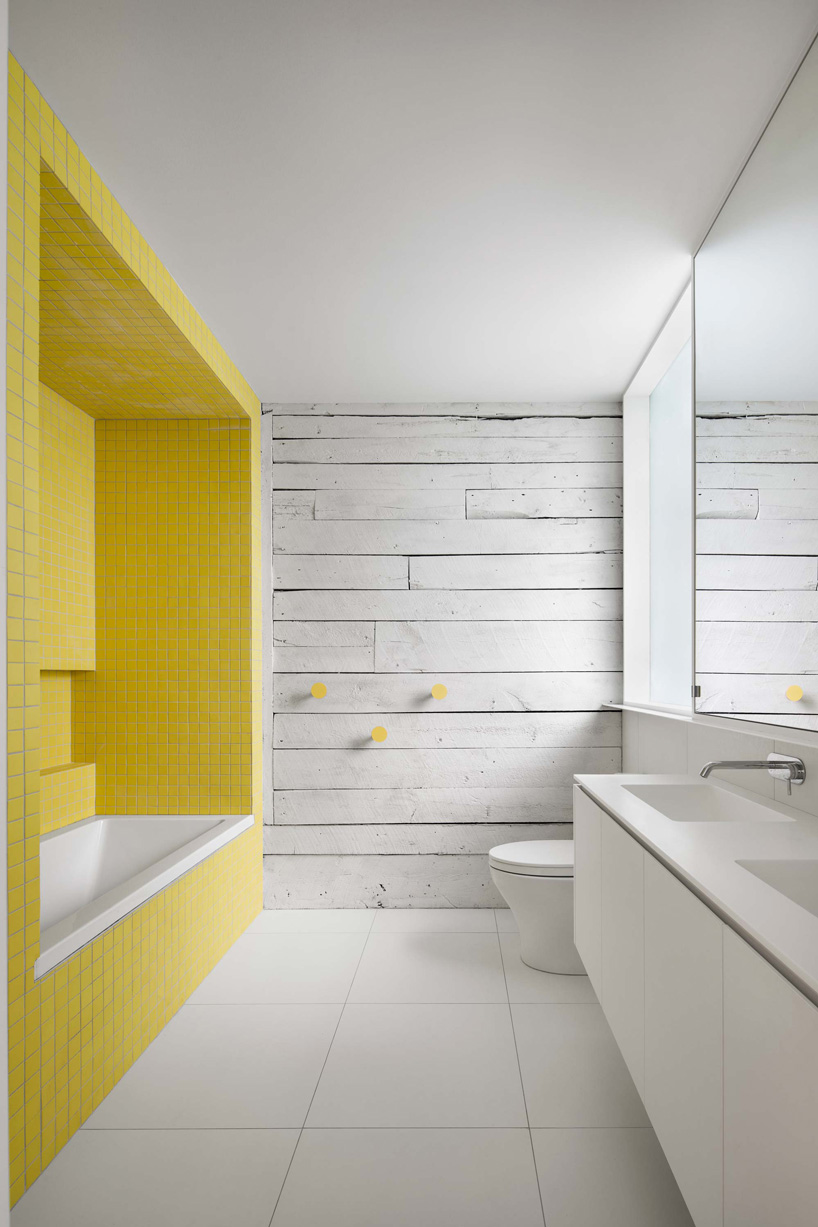 sage green staircase takes center stage in montreal residence renovation by naturehumaine