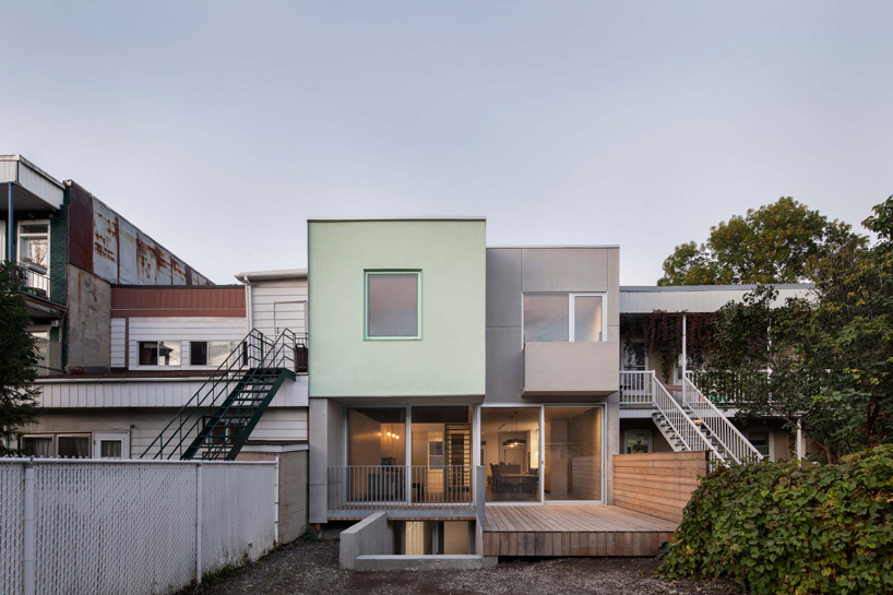 sage green staircase takes center stage in montreal residence renovation by naturehumaine