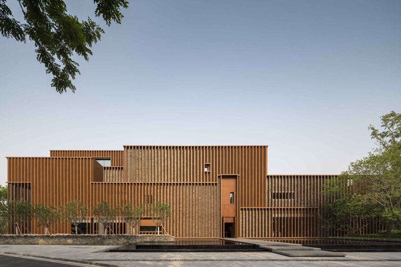 warm-toned aluminum panels clad neri&hu's junshan cultural center in beijing