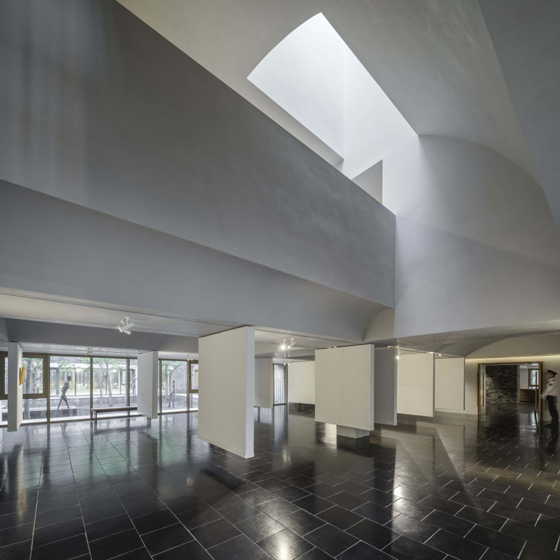 warm-toned aluminum panels clad neri&hu's junshan cultural center in beijing