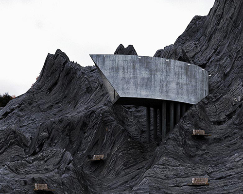 iranian designer reza mohtashami envisions the sweeping 'concrete house' as a feature of the landscape