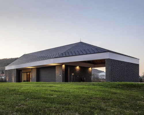 the winemaker's house by SAGRA architects builds on local traditions in rural hungary
