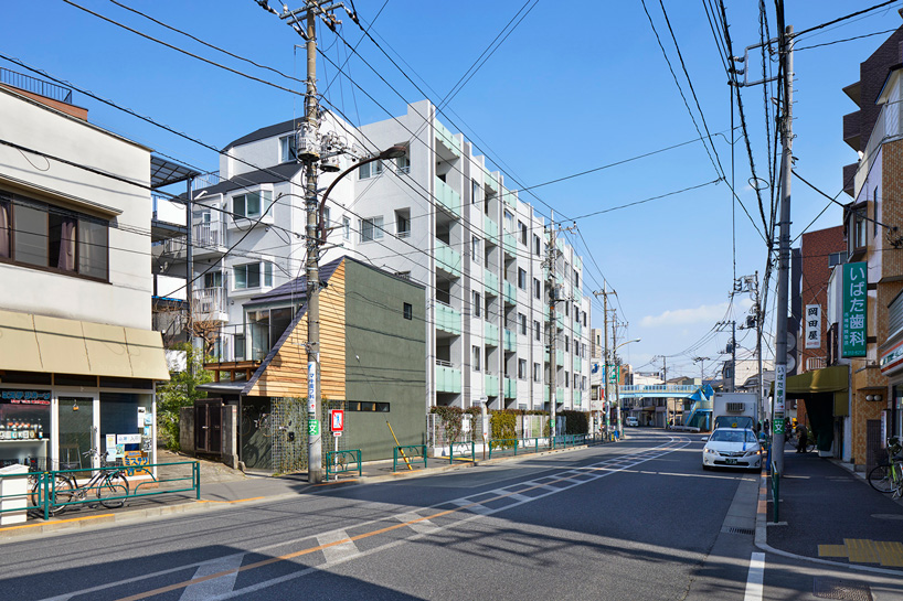 sinato builds three-story wooden house in tokyo as intricate single room