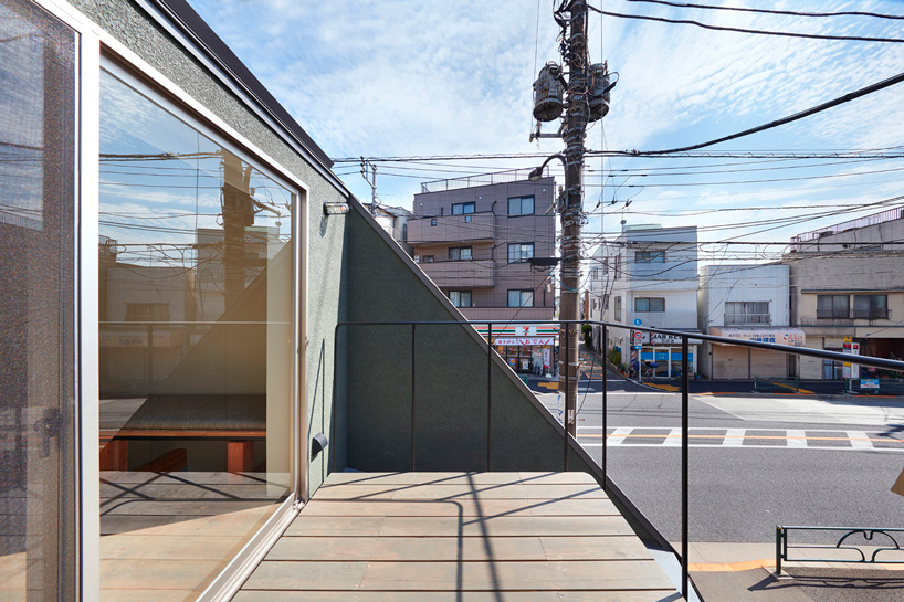 sinato builds three-story wooden house in tokyo as intricate single room