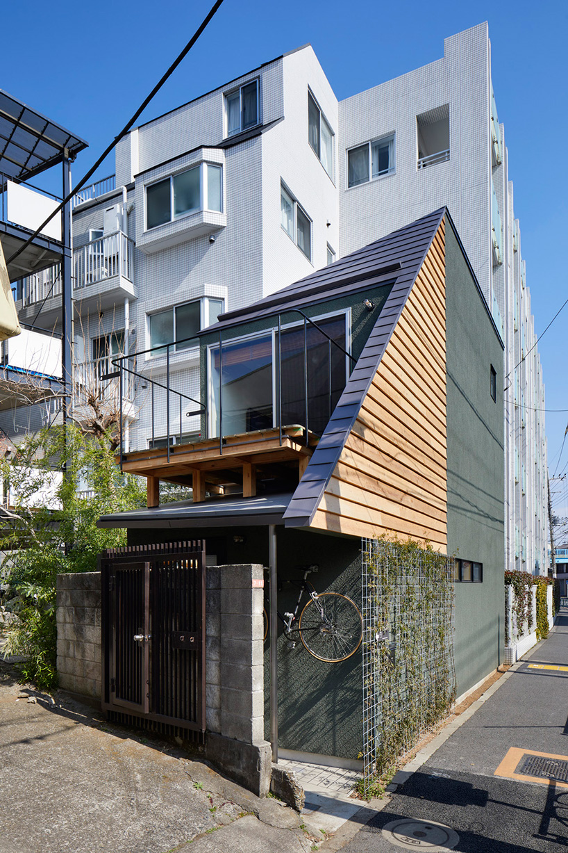 sinato builds three-story wooden house in tokyo as intricate single room